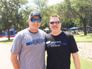 Sheriff-elect Robert Chody and Cedar Park Councilman Lyle Grimes at the Back the Badge barbecue. 